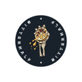 Circular design with skeleton hand holding a juicy half lemon, surrounded by text saying "Bitterhalf" on a black background